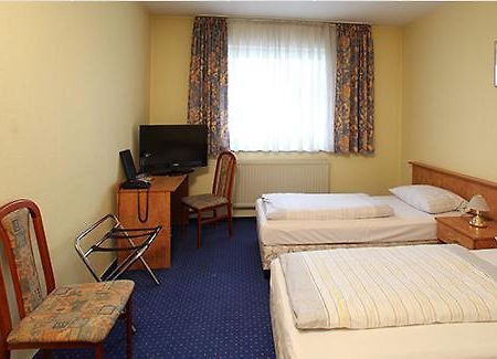 Albatros Airport Hotel Мёрфэльден-Вальдорф Номер фото